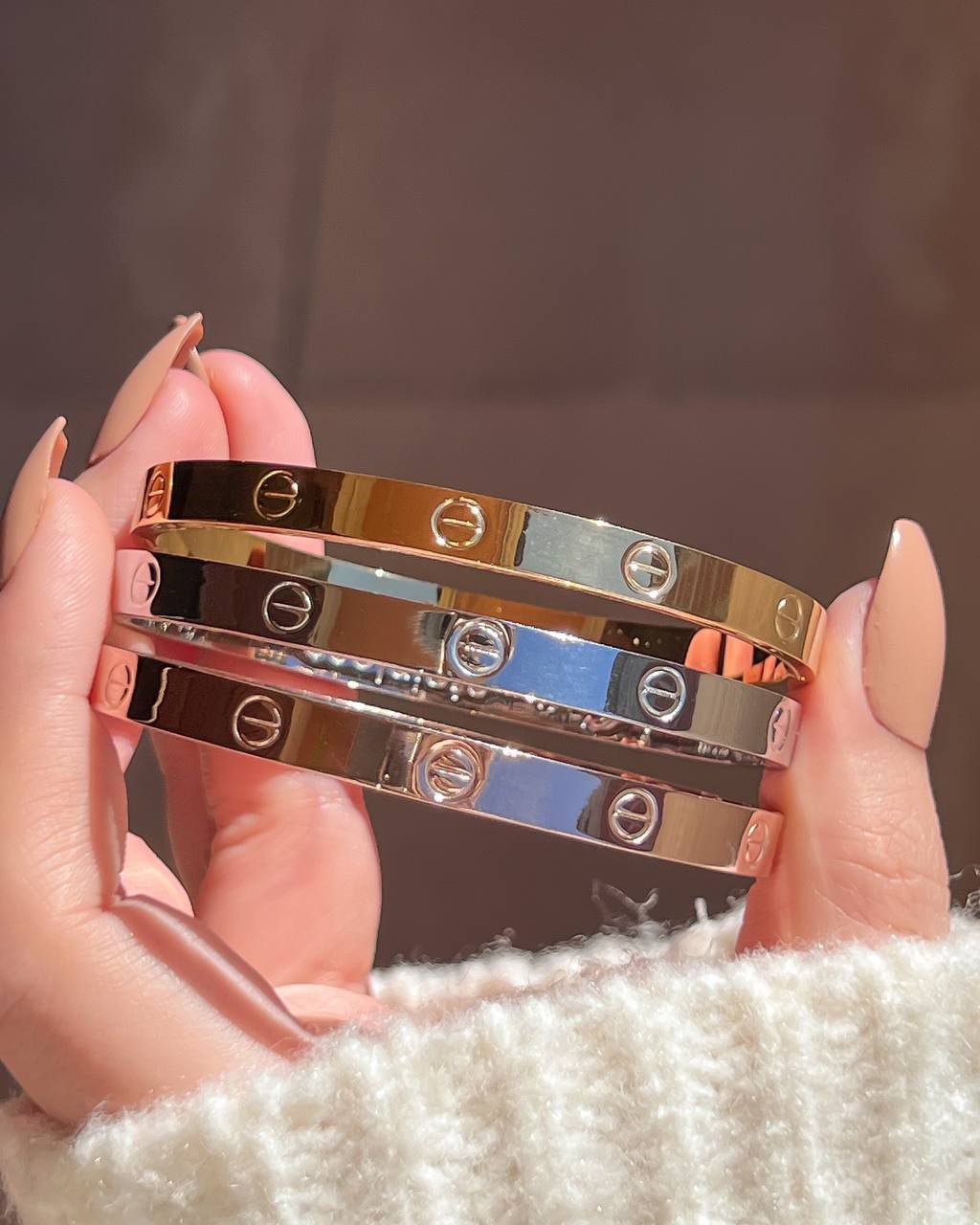 3 Cartier stainless steel bracelets